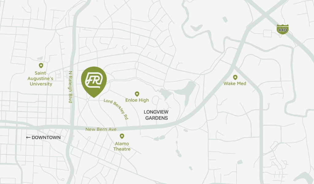 A map highlighting a location marked with an "FR" symbol near Lord Berkley Road, close to Enloe High, Longview Gardens, Saint Augustine's University, Wake Med, and Alamo Theatre.